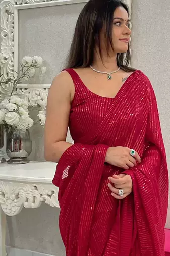 Maroon all-over sequins striped georgette party wear saree with blouse piece