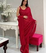 Maroon all-over sequins striped georgette party wear saree with blouse piece