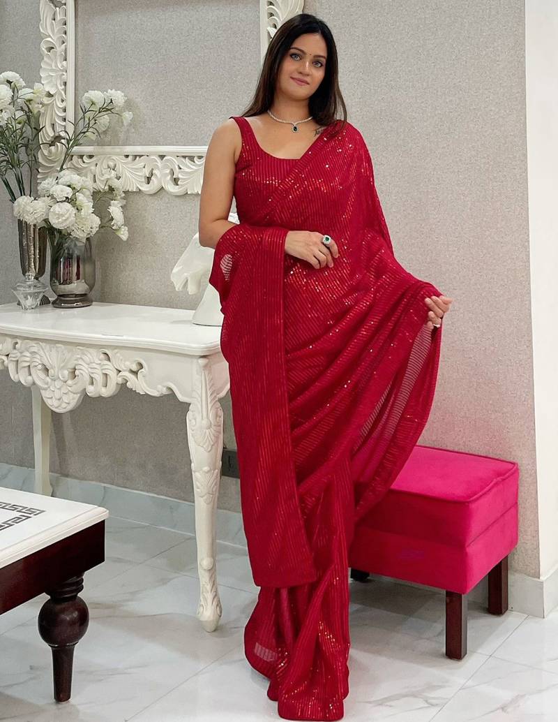 Maroon all-over sequins striped georgette party wear saree with blouse piece