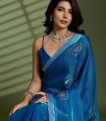Blue silk blend satin embellished saree with unstitched blouse piece