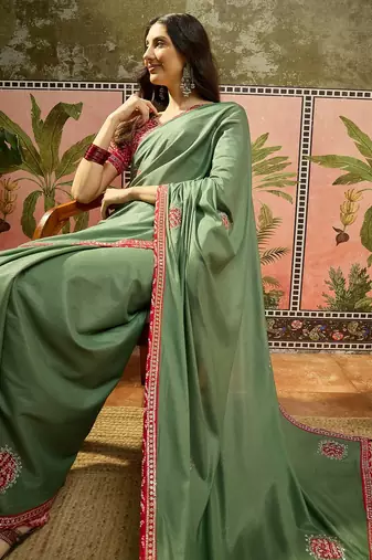 Green chiffon bandhni saree with unstitched blouse piece