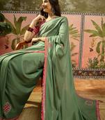 Green chiffon bandhni saree with unstitched blouse piece