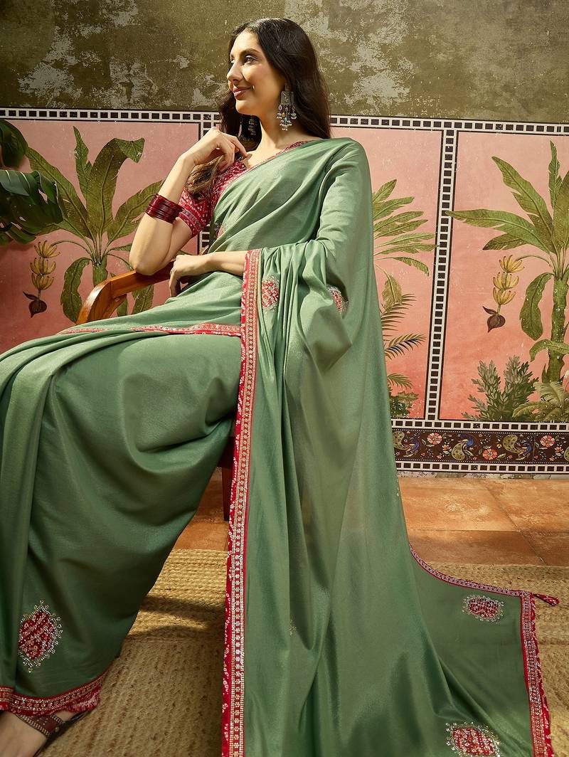 Green chiffon bandhni saree with unstitched blouse piece