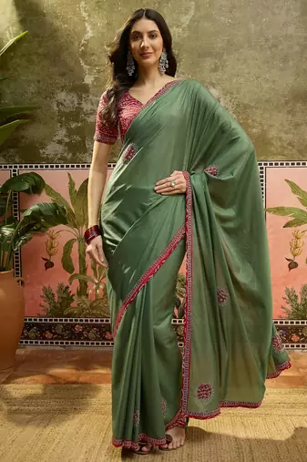 Green chiffon bandhni saree with unstitched blouse piece