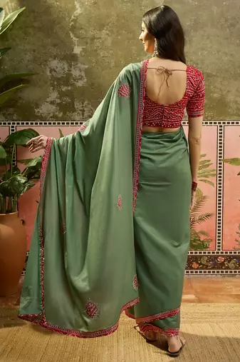 Green chiffon bandhni saree with unstitched blouse piece