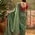 Green chiffon bandhni saree with unstitched blouse piece