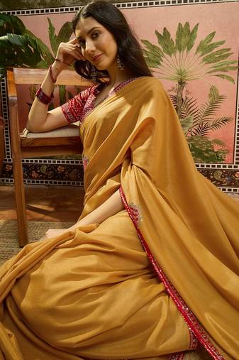 Mustard chiffon bandhni saree with unstitched blouse piece