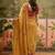 Mustard chiffon bandhni saree with unstitched blouse piece