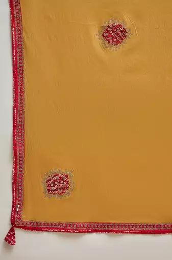 Mustard chiffon bandhni saree with unstitched blouse piece