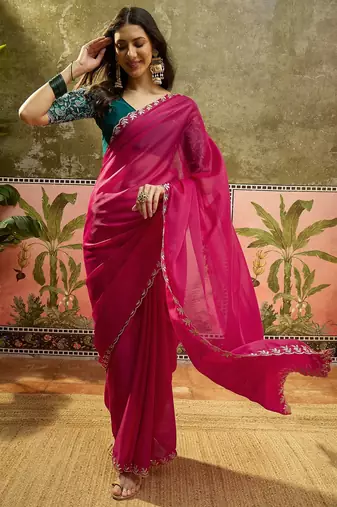 Rani neon chiffon embroidered saree with unstitched blouse piece
