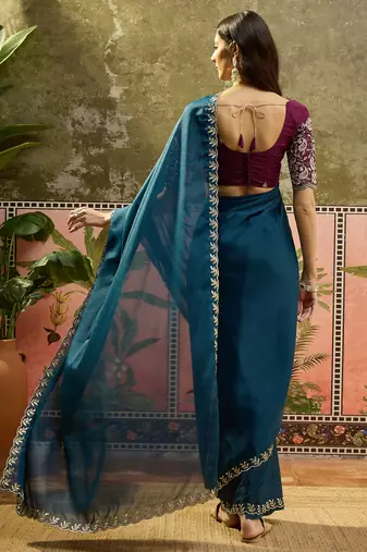 Teal neon chiffon embroidered saree with unstitched blouse piece