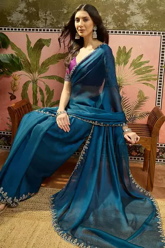 Teal chiffon embeoidered saree with unstitched blouse piece