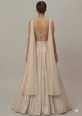 off-white sequin embroidered wedding lehenga with sweetheart neck blouse 2