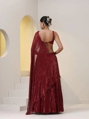 dark red all-over sequin partywear lehenga with sweetheart neck blouse 2