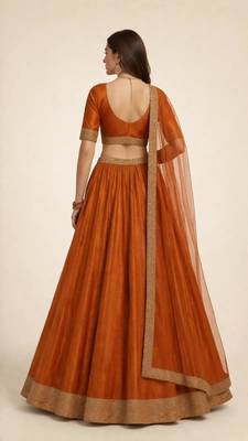 rust orange traditional lehenga with embroidered zari border 2