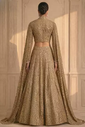 Luxury Gold Sequin Lehenga with Attached Floor-Length Cape Sleeves