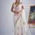 White color soft oregenza tissue handwork zircon border saree