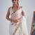 White color soft oregenza tissue handwork zircon border saree