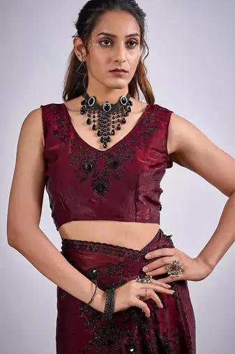 Maroon color fendy satin silk blend two tone zircon cut dana handwork saree