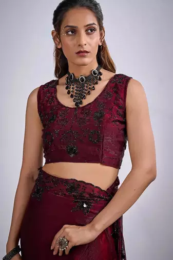 Maroon color fendy silk blend two tone zircon sequence butta work saree