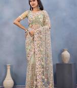 Pista color net resham embroidered & handwork zircon work saree
