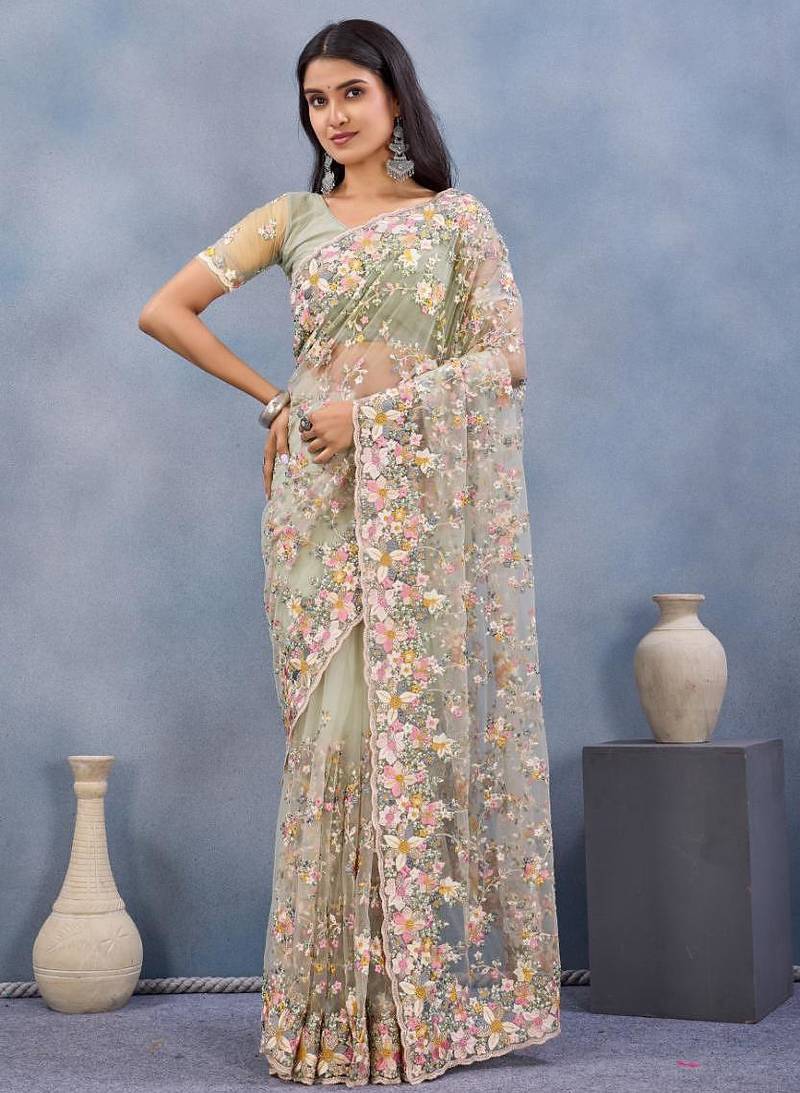 Pista color net resham embroidered & handwork zircon work saree