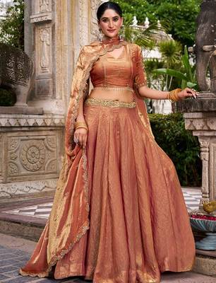 Metallic Rust Orange Fendi Silk Lehenga Choli Set With Zari Weaving Dupatta Free Size Upto 42 1