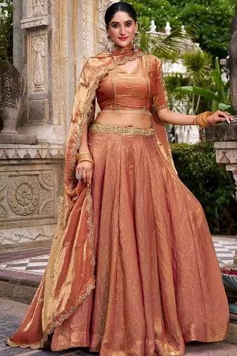 Metallic Rust Orange Fendi Silk Lehenga Choli Set With Zari Weaving Dupatta Free Size Upto 42