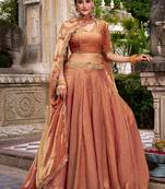 Metallic Rust Orange Fendi Silk Lehenga Choli Set With Zari Weaving Dupatta Free Size Upto 42