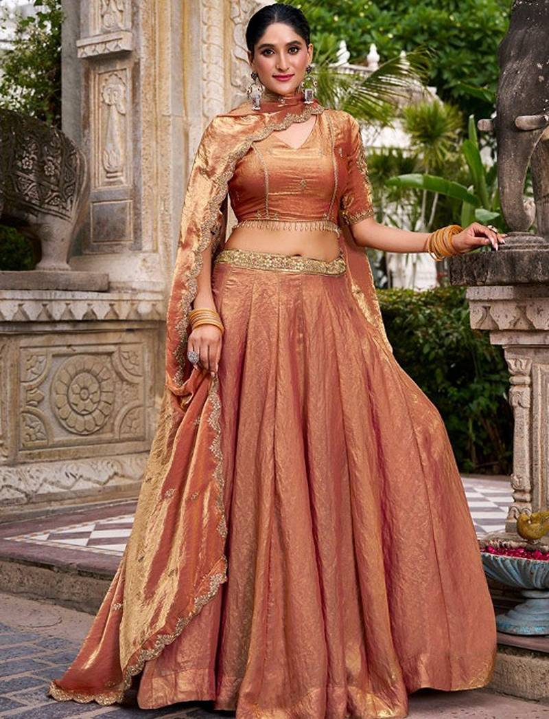 Metallic Rust Orange Fendi Silk Lehenga Choli Set With Zari Weaving Dupatta Free Size Upto 42