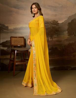 Yellow embroidered leheriya georgette saree with designer border 4