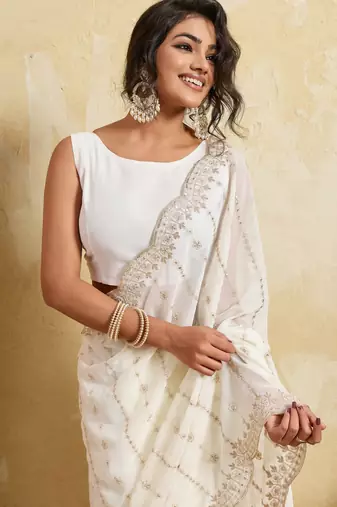 Glamorous white georgette silk multi sequins embroidered indaindesigner bollywood saree