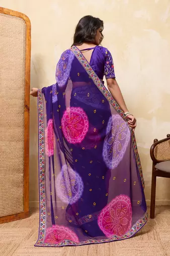 Alluring blue georgette sequins embroidered indian designer wedding saree