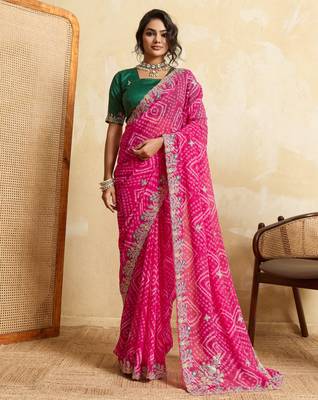 Entrancing pink georgette sequins embroidered indaindesigner bollywood saree 1