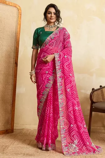 Entrancing pink georgette sequins embroidered indaindesigner bollywood saree