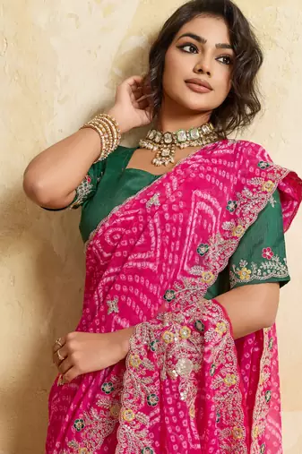 Entrancing pink georgette sequins embroidered indaindesigner bollywood saree
