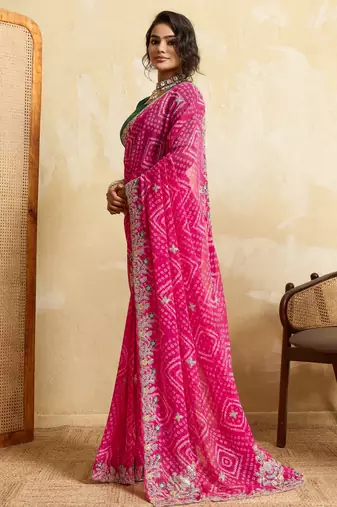 Entrancing pink georgette sequins embroidered indaindesigner bollywood saree