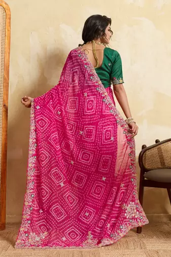 Entrancing pink georgette sequins embroidered indaindesigner bollywood saree