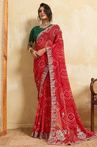 Enthralling red georgette sequins embroidered indina wedding saree