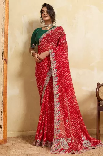 Enthralling red georgette sequins embroidered indina wedding saree