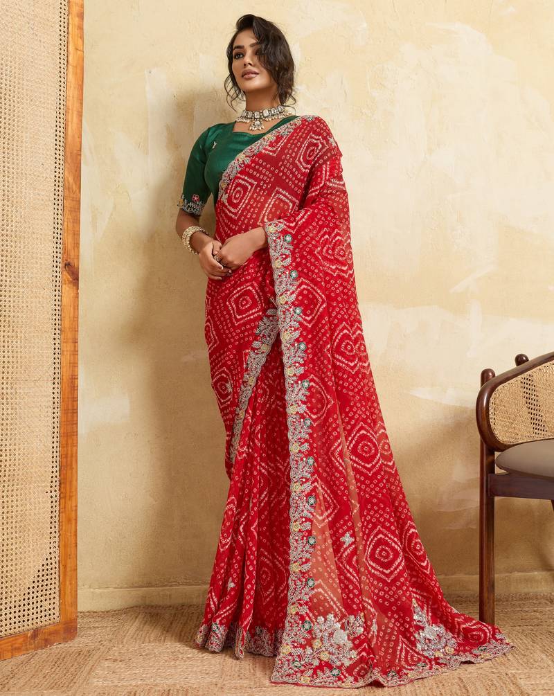 Enthralling red georgette sequins embroidered indina wedding saree