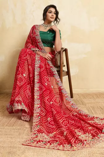 Enthralling red georgette sequins embroidered indina wedding saree
