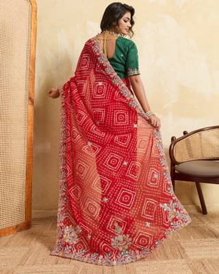 Enthralling red georgette sequins embroidered indina wedding saree 4