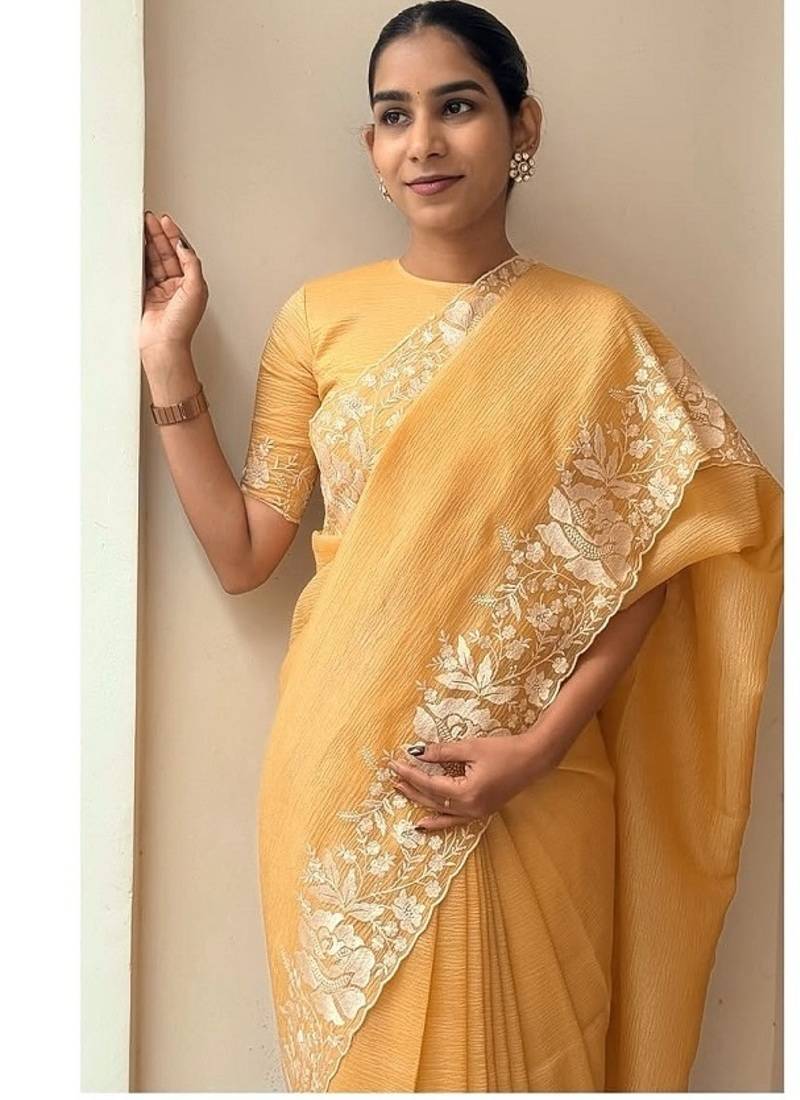 Yellow Color Floral Embroidered Border of White Thread and cut work Silk Saree
