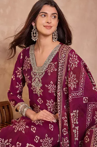 Women purple floral printed kurta with trousers and dupatta