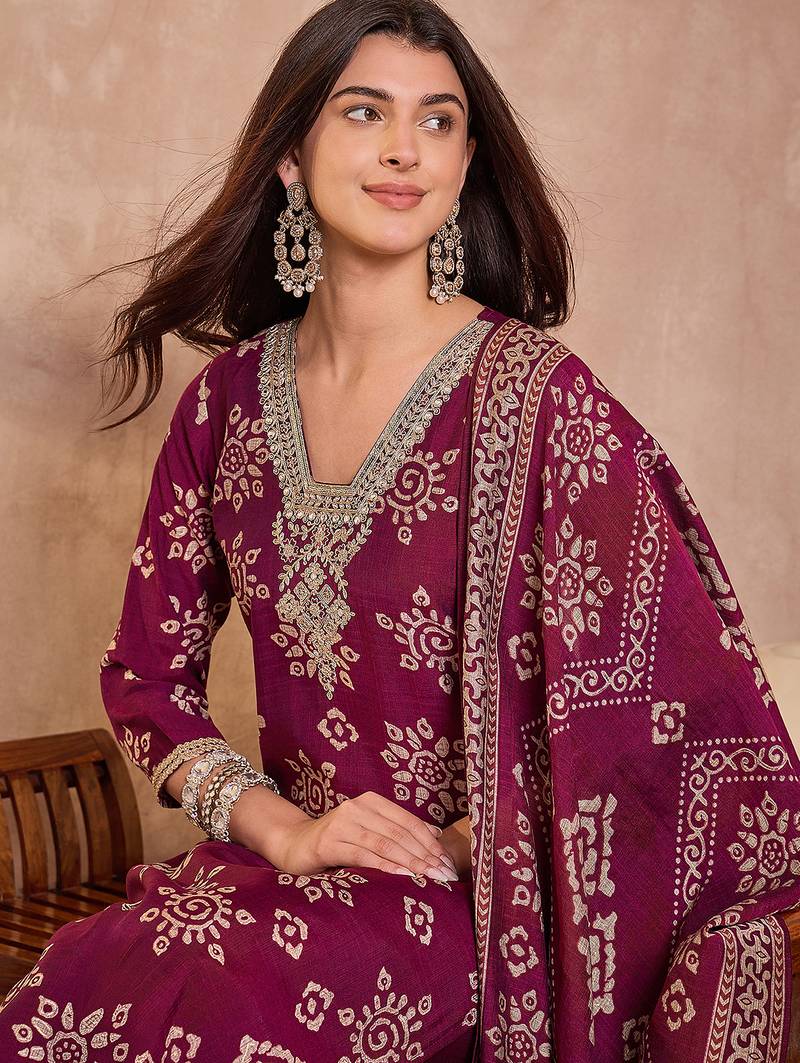 Women purple floral printed kurta with trousers and dupatta