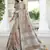 Sutriti women brown linen saree with floral embroidery border & tassels