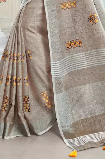 women brown linen saree with floral embroidery border & tassels