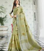 women light green linen saree with floral embroidery border & tassels