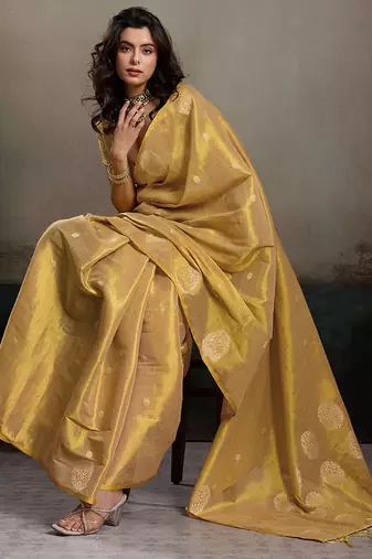 women golden beige woven tissue silk blend saree with mandala motifs